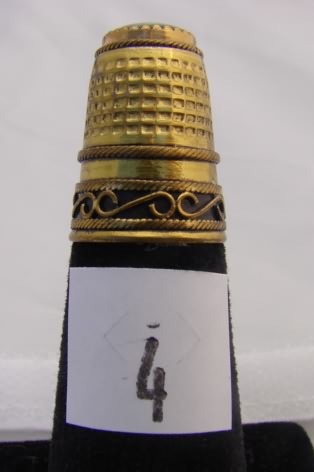 Appraisal: USA brass thimble with opal stone top