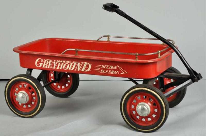 Appraisal: Hamilton Greyhound Wagon Pedal Toy Description s Pressed steel Deluxe