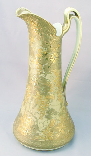 Appraisal: LARGE GRAPE DESIGN NIPPON PORCELAIN PITCHER Gold on green ground