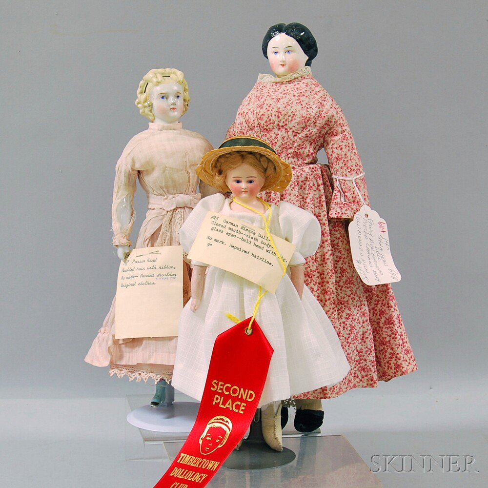 Appraisal: Three China and Bisque Lady-type Dolls Germany a small unmarked