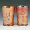 Appraisal: Carnival glass tumblers two Unmarked Scratches and minor chips tall