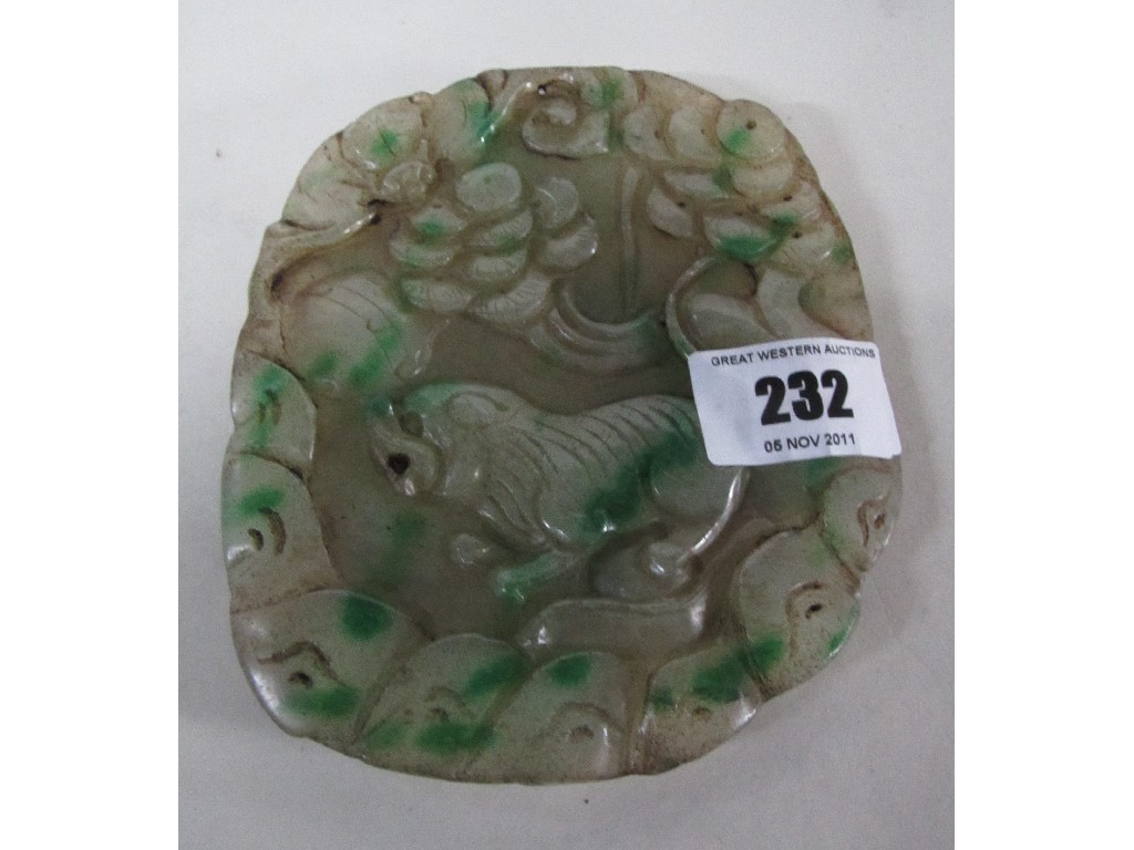 Appraisal: Carved jade plaque depicting a tiger amid foliage