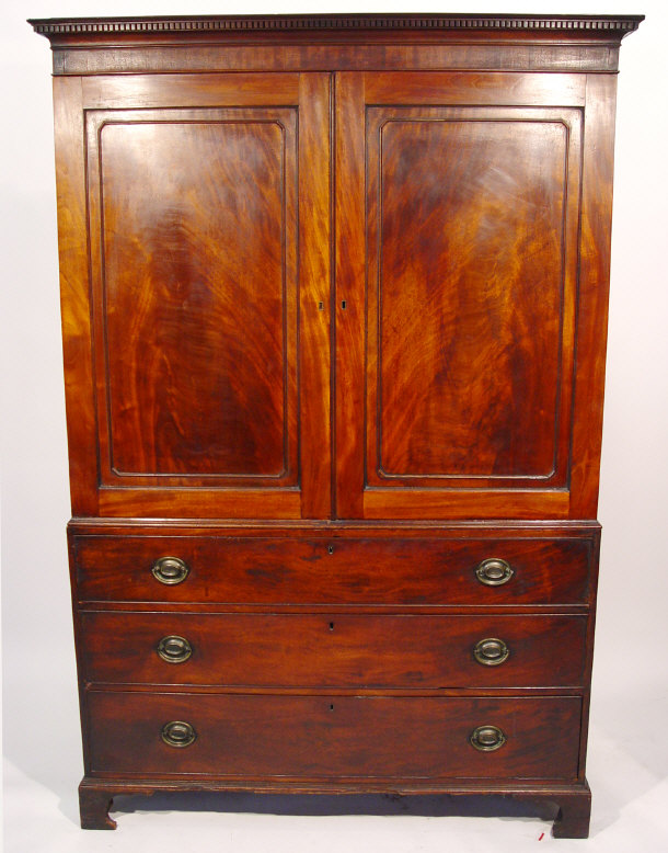 Appraisal: th Century mahogany linen press with dental moulded cornice above