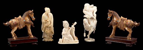 Appraisal: A group of five ivory carvings comprising a sage a