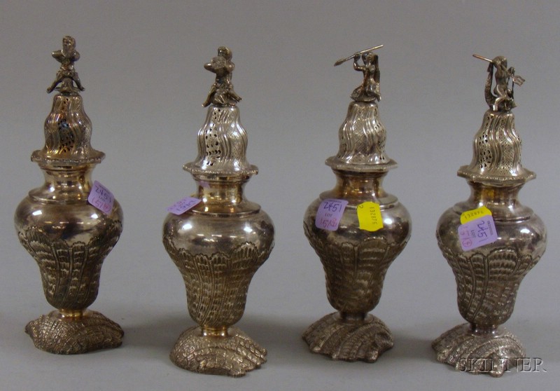 Appraisal: Set of Four Classically Decorated Muffineer silver plated with shell-form