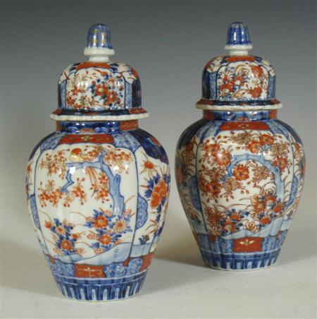 Appraisal: A pair of Japanese Imari vases and covers each of