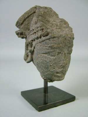 Appraisal: A th century Indian carved granite head of Bhairravi cm