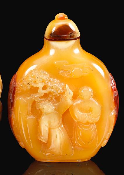 Appraisal: A carved hornbill snuff bottle Of flattened ovoid form the