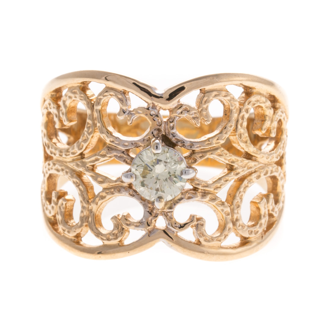 Appraisal: A Lady's Wide Filigree Diamond Band Ring K yellow gold