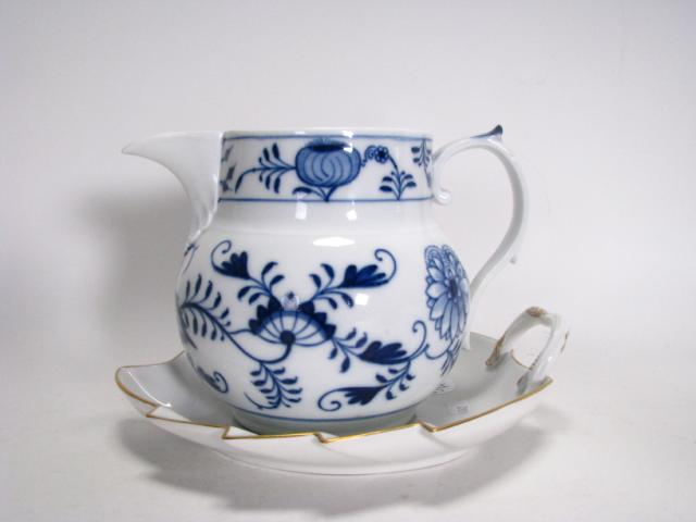 Appraisal: Two pieces of Meissen porcelain including milk pitcher and leaf