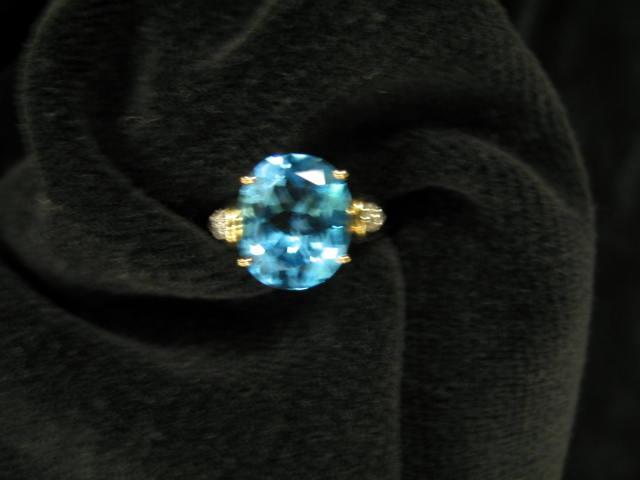 Appraisal: Blue Topaz Ring rich oval gem in k yellow gold