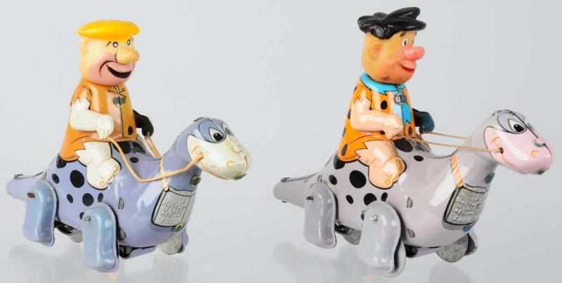 Appraisal: Lot of Tin Linemar Flintstone Wind-Up Toys American Working Includes