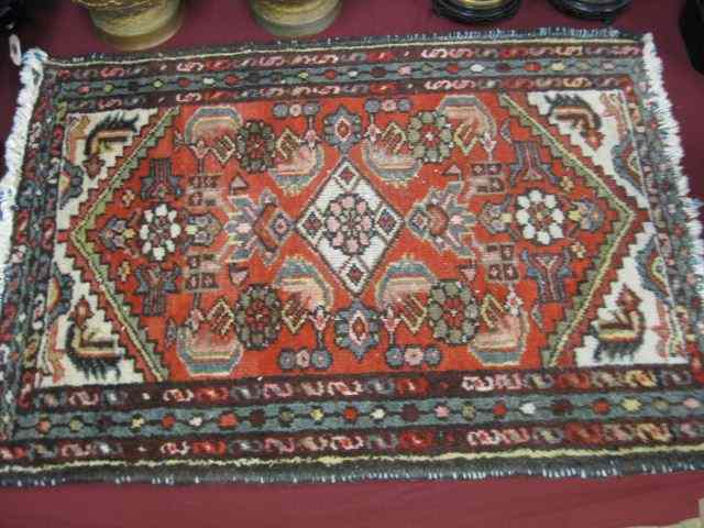 Appraisal: Hamadan Persian Handmade Mat stylized floral on red field '