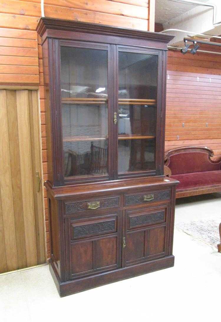 Appraisal: A VICTORIAN CABINET BOOKCASE ON CUPBOARD English late th century