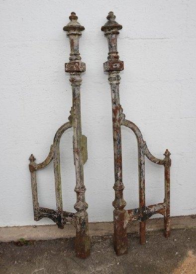 Appraisal: A pair of cast iron octagonal gate posts with rail