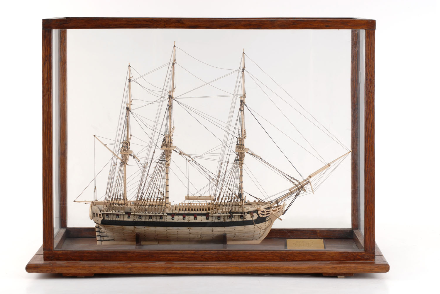 Appraisal: CASED PRISONER-OF-WAR BONE MODEL OF THE U S FRIGATE CONSTELLATION