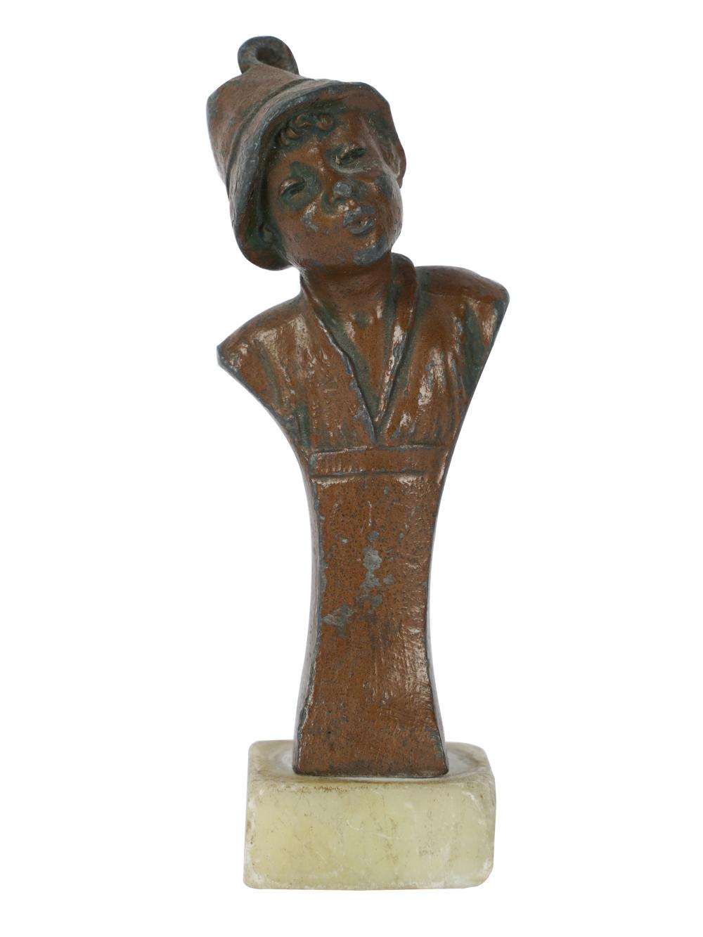 Appraisal: BRONZE BUST OF A YOUTHunsigned mounted to a stone base