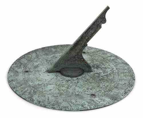 Appraisal: English bronze sundial th c with engraved star scrolls and