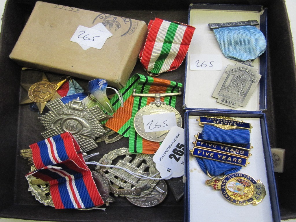 Appraisal: Lot comprising WWII medals other medals and military badges