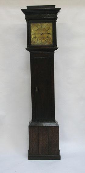 Appraisal: A GEORGE III OAK LONGCASE CLOCK with a brass dial