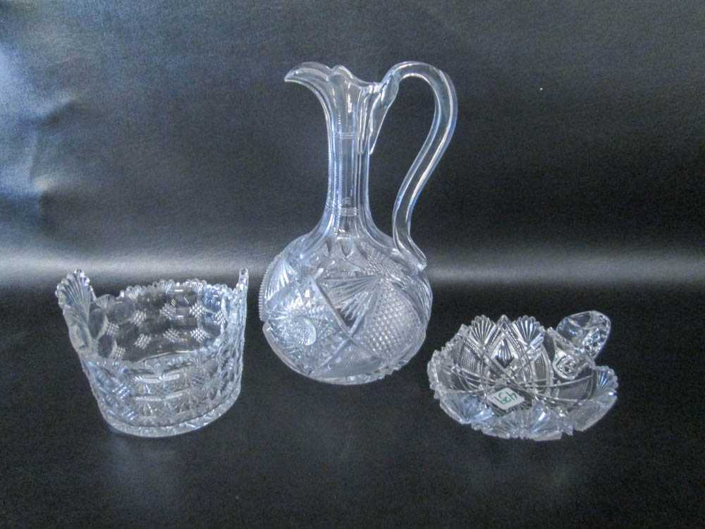 Appraisal: THREE CUT CRYSTAL TABLEWARE PIECES including a ewer H a