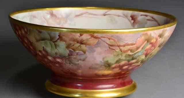 Appraisal: LIMOGES PUNCH BOWL IN STYLE OF FRANZ BISHOFFBeautiful hand-painted Limoges