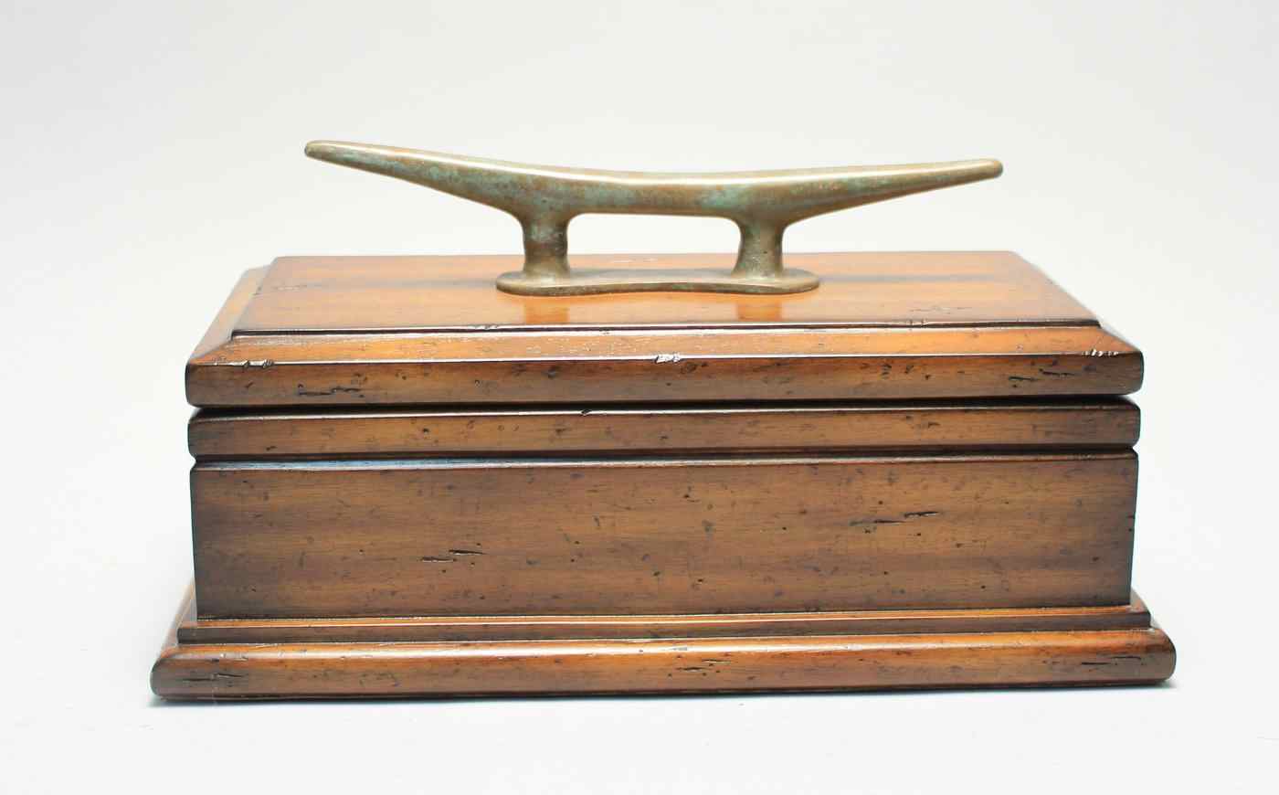 Appraisal: WOODEN COVERED BOX WITH YACHT'S CLEAT SURMOUNT th CenturyIn mahogany