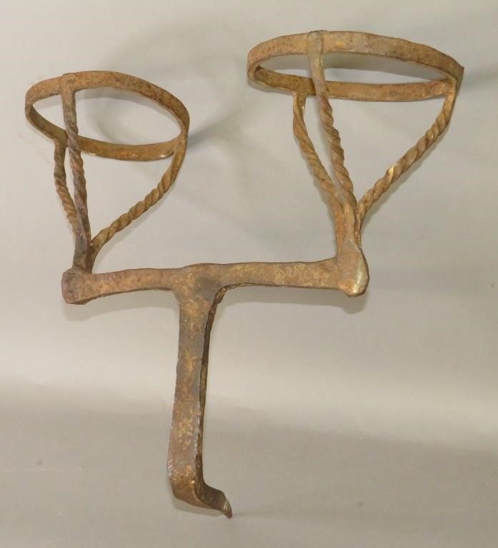 Appraisal: WROUGHT IRON LIGHTING BRACKETca th or th century primitive form