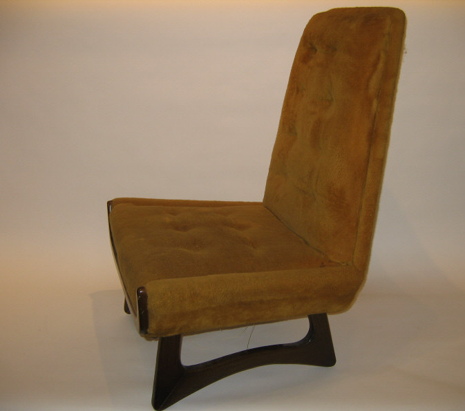 Appraisal: MANNER OF VLADIMIR KAGAN Gold upholstered lounge chair raised on