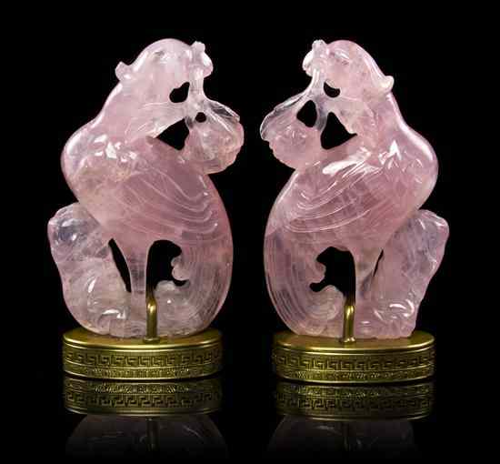 Appraisal: A Pair of Rose Quartz Models of Phoenixes the translucent