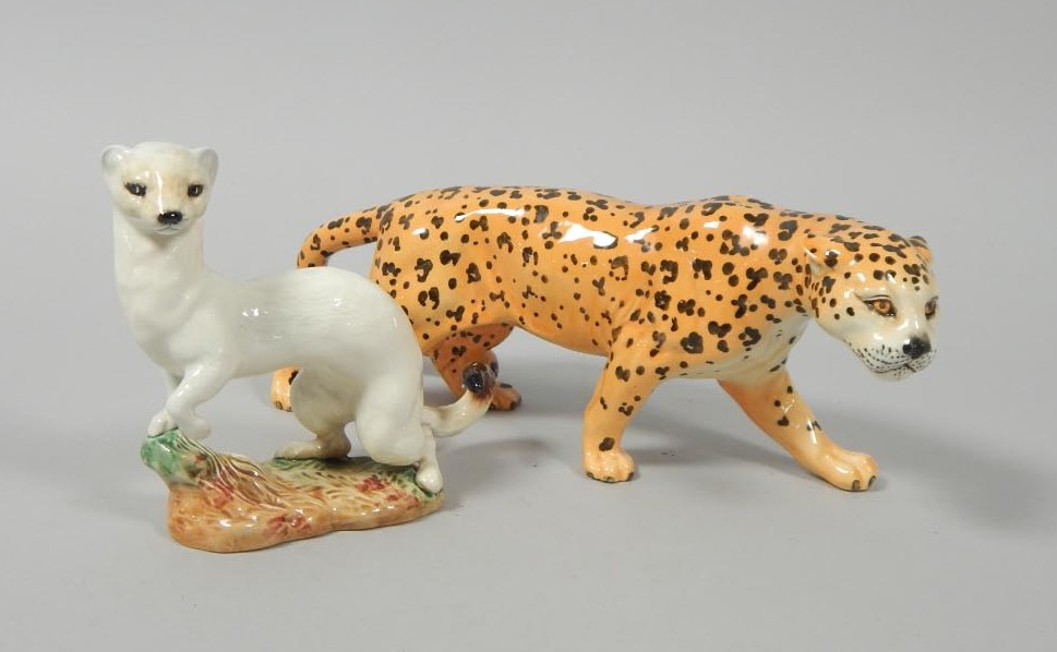 Appraisal: Two Beswick animals a figure of a leopard cm wide