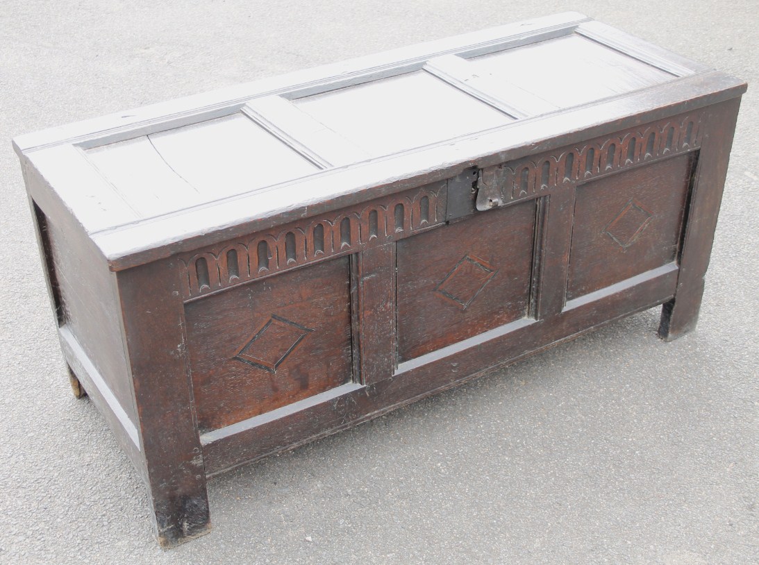 Appraisal: A principally early thC oak three panel coffer the shaped