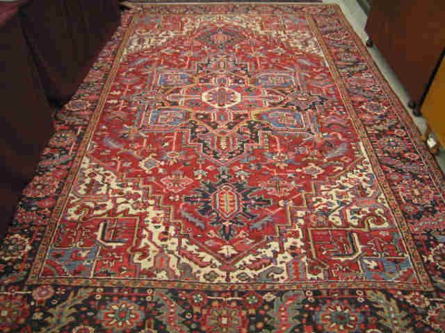 Appraisal: Heriz Persian Handmade Room Size Rug central medallion interesting geometrics