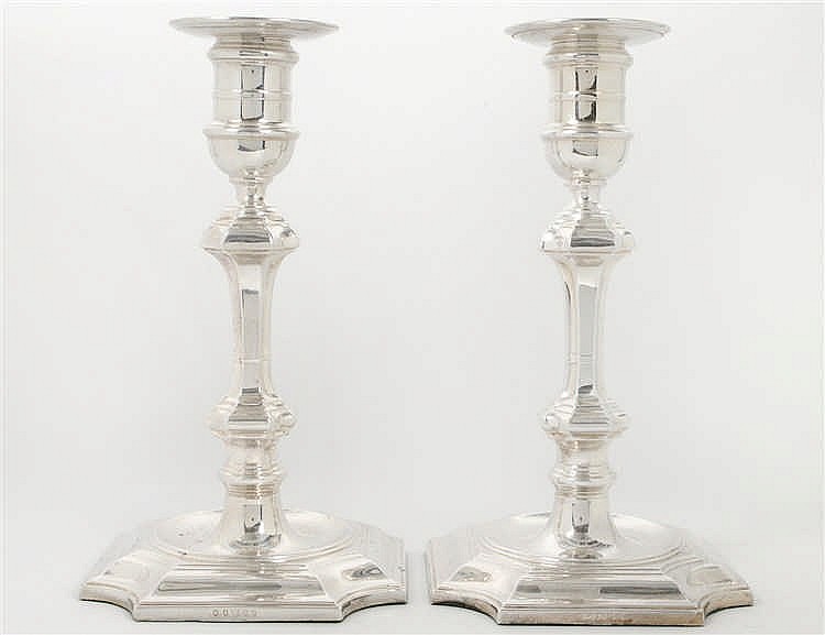 Appraisal: PAIR OF BAROQUE STYLE SILVER PLATE CANDLESTICKSEnglish Late th Early