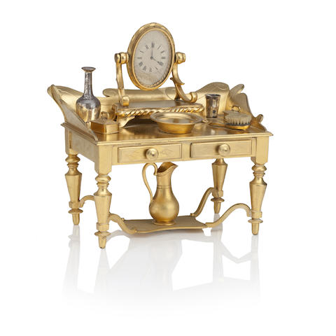 Appraisal: A gilt-metal model of a dressing table The dressing table