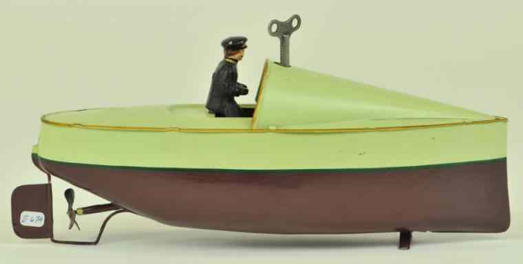 Appraisal: BING CLOCKWORK SPEEDBOAT Germany circa seated driver appealing colors of