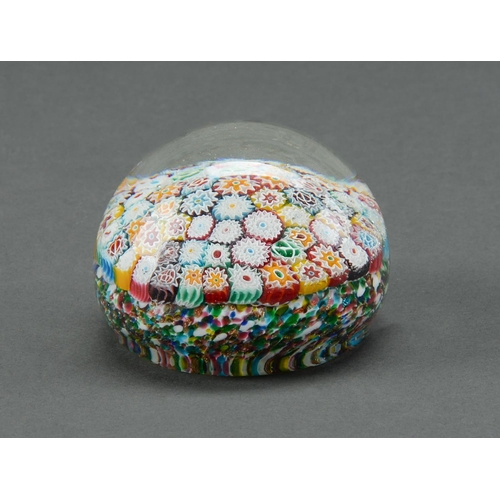 Appraisal: A glass millefiori paperweight th c mm diam More Information