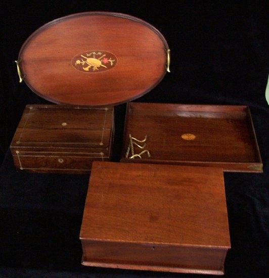 Appraisal: An Edwardian mahogany and brass mounted tray with inlaid patera