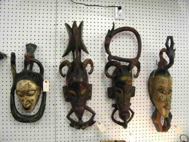 Appraisal: African Tribal Masks carved painted some repairs