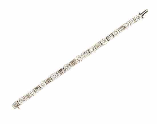 Appraisal: A Platinum and Diamond Line Bracelet Trabert Hoeffer containing one