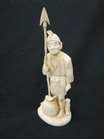 Appraisal: Japanese Carved Ivory Figure of a Fisherman basket of fish