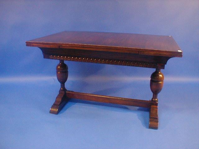 Appraisal: An oak refectory style drawer leaf dining table with bulbous