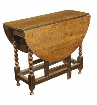 Appraisal: A late th century oak gateleg table the oval drop-leaf