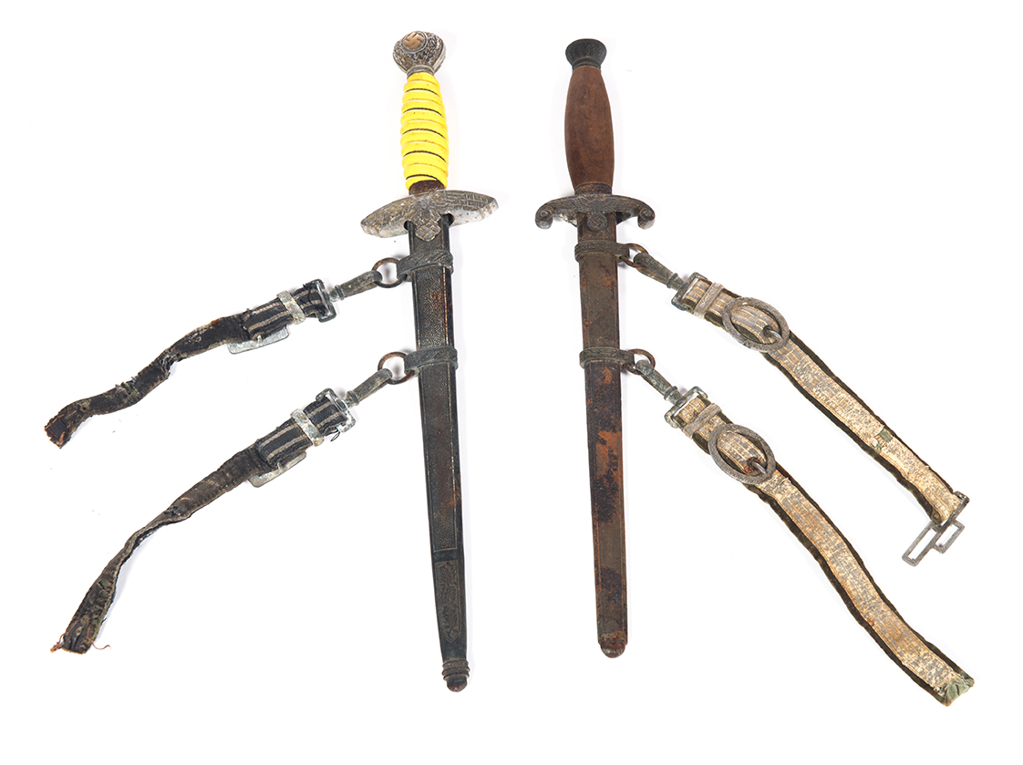 Appraisal: TWO WORLD WAR II GERMAN DAGGERS WITH SCABBARDS Germany nd