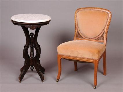 Appraisal: AMERICAN AESTHETIC MOVEMENT CARVED MAPLE SLIPPER CHAIR The padded shaped