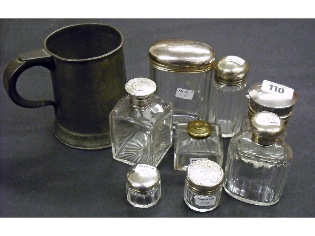 Appraisal: Five silver topped scent bottles of different forms and sizes