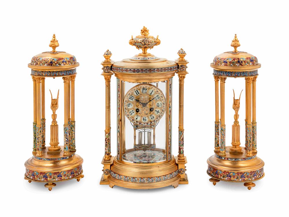 Appraisal: A Continental Enameled Gilt Metal Crystal Regulator Clock Garniture A