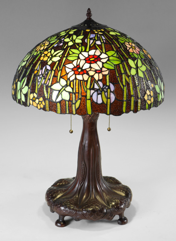 Appraisal: TIFFANY STYLE TABLE LAMP Contemporary leaded glass table lamp shaped