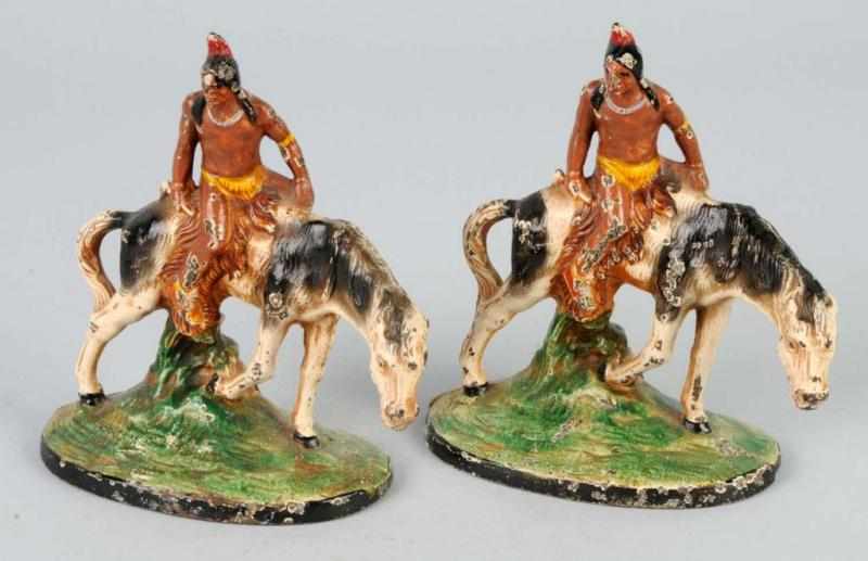 Appraisal: Cast Iron Indian Brave on Horseback Bookends Description Made by