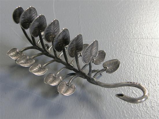 Appraisal: Early Victorian silver toast rack formed as lily leaves and